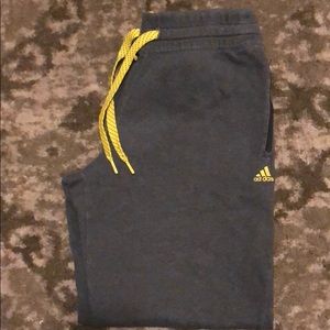 Comfortable Adidas sweat pants with zippers size L